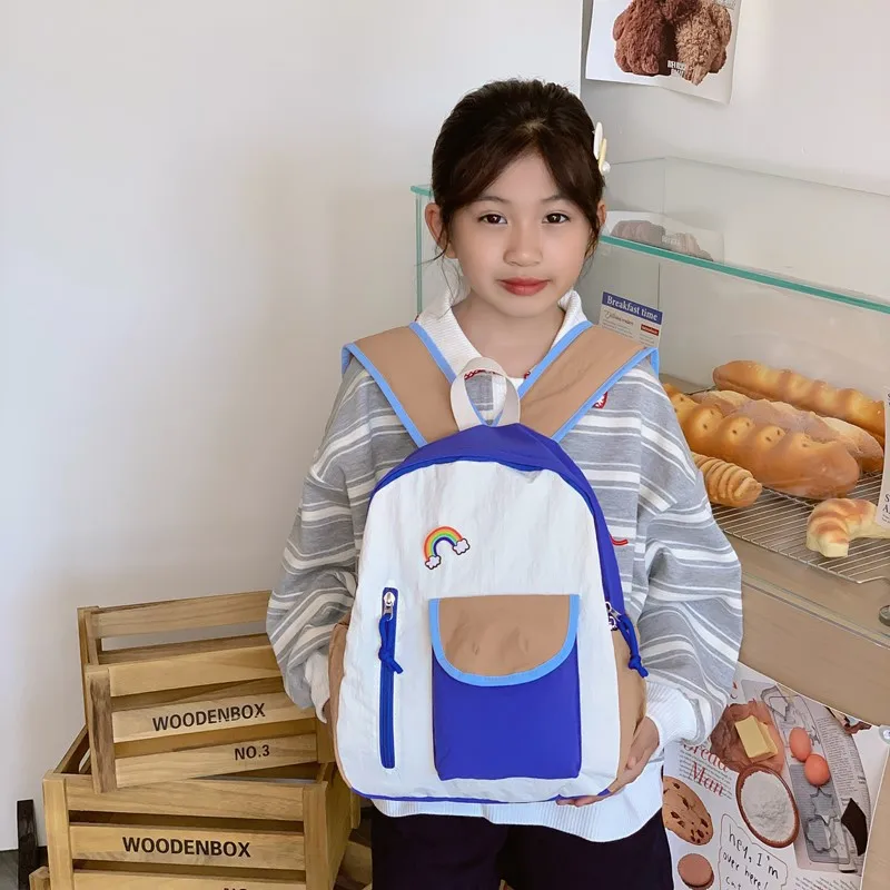 Cute girls' backpacks with zippers and contrasting colors, large-capacity children's sports and mountaineering backpacks