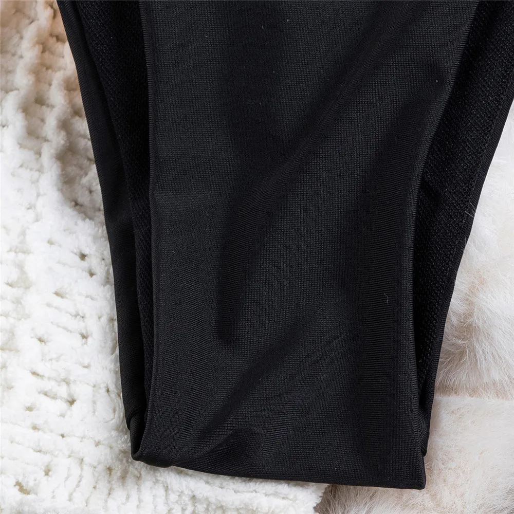 أطقم بيكيني باللون الأسود والأبيض المتباين مع سلسلة برباط علوي ملابس سباحة مثيرة للنساء 2025 ملابس سباحة للسيدات مفرغة