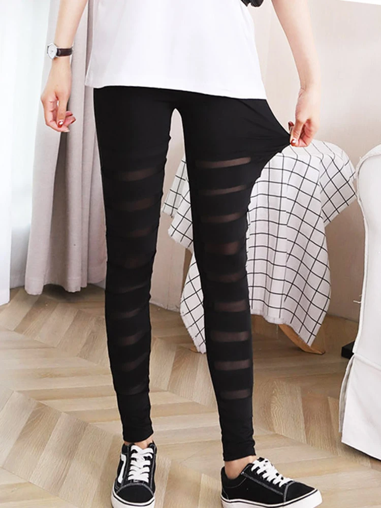 Sexy legginsy siatkowa bandażowa gotycka szczupły Streetwear Leggins Punk Rock spodnie elastyczny dopasowany do ciała kobiet Jegging