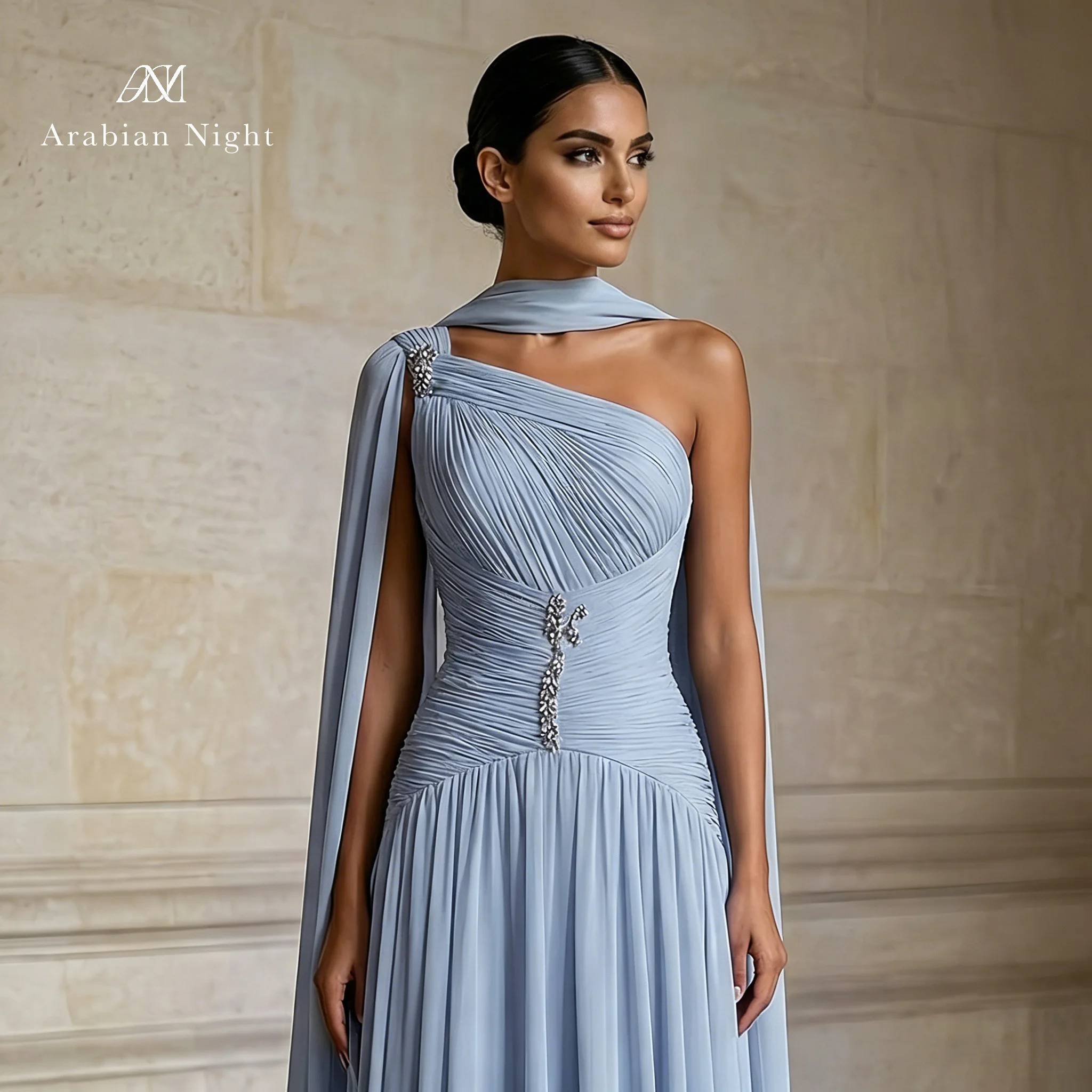 Blue one-shoulder strapless sleeveless maxi dress formal occasion prom gown featuring draping and metallic embellishment