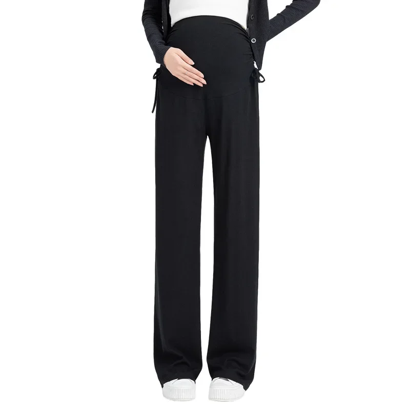 أثناء الحمل، يجب ارتداء السراويل واسعة الساق على السراويل ذات الأرجل المستقيمة برباط