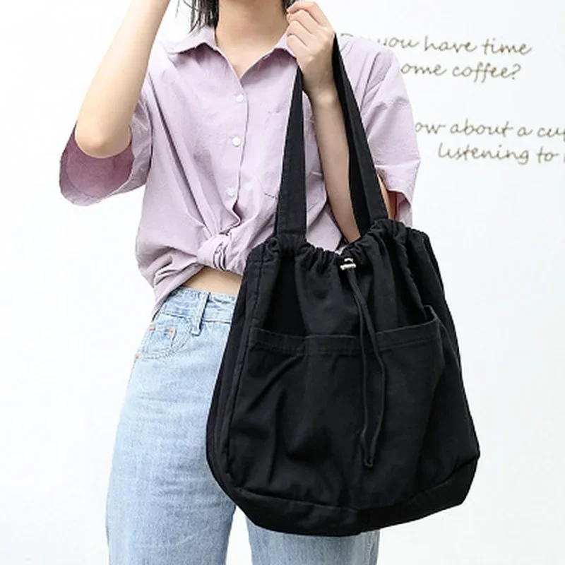 2023 New Canvas Bag Women's One Shoulder Drawstring Multi Pocket Japanese Simple Large Capacity Casual Versatile Tote Bag