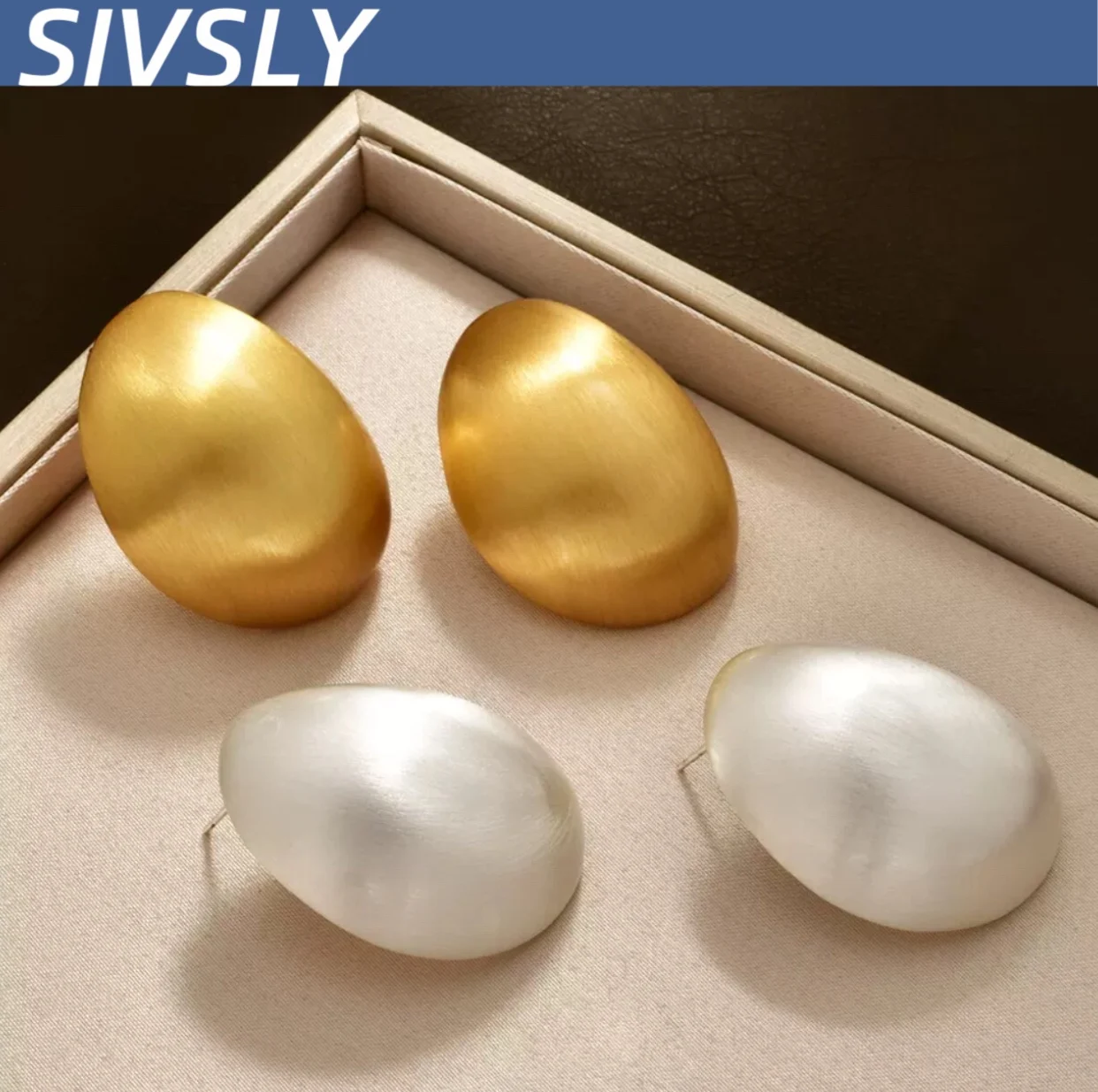 

[Personality] Cold wind egg shell fashion all-round lace oval earring European and American exaggerated personality temperament