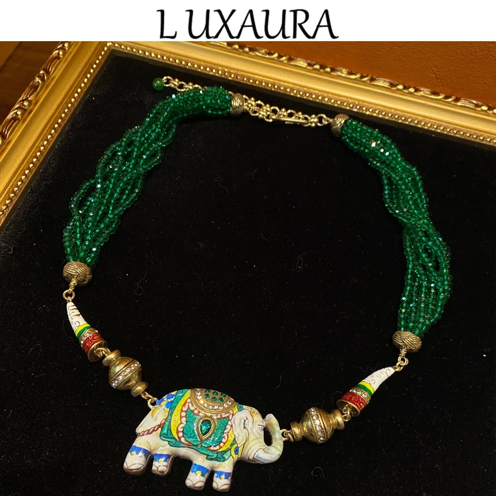 

Vintage fashion classic copper plated 18K green elephant pendant paired with bohemian women's jewelry necklace
