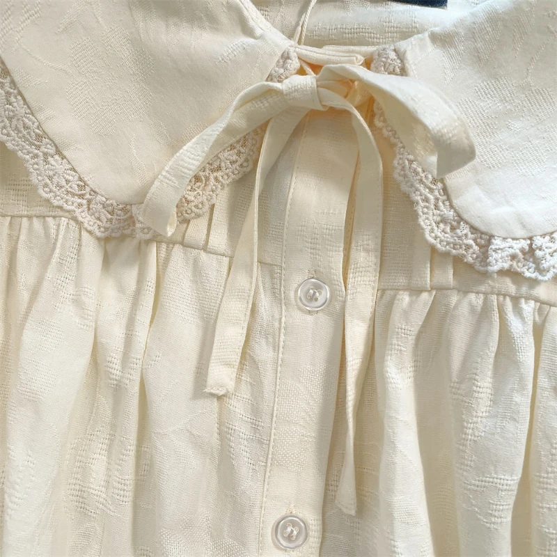 เสื้อเชิ้ตคอปีเตอร์แพนสไตล์ญี่ปุ่นน่ารักสำหรับผู้หญิง เสื้อแขนยาวผูกโบว์หวานๆ เสื้อทรงหลวมติดกระดุม เข้าได้กับทุกชุด สไตล์ Y2k