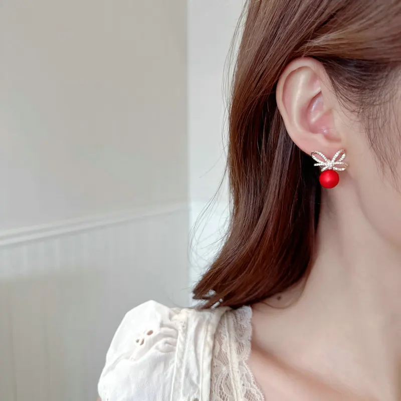 أقراط على شكل فيونكة للأذن لموسم الخريف والشتاء، إكسسوار أذن فريد وراقي أحمر وأكثر احتفالية وأنيقة للنساء جديد 2025