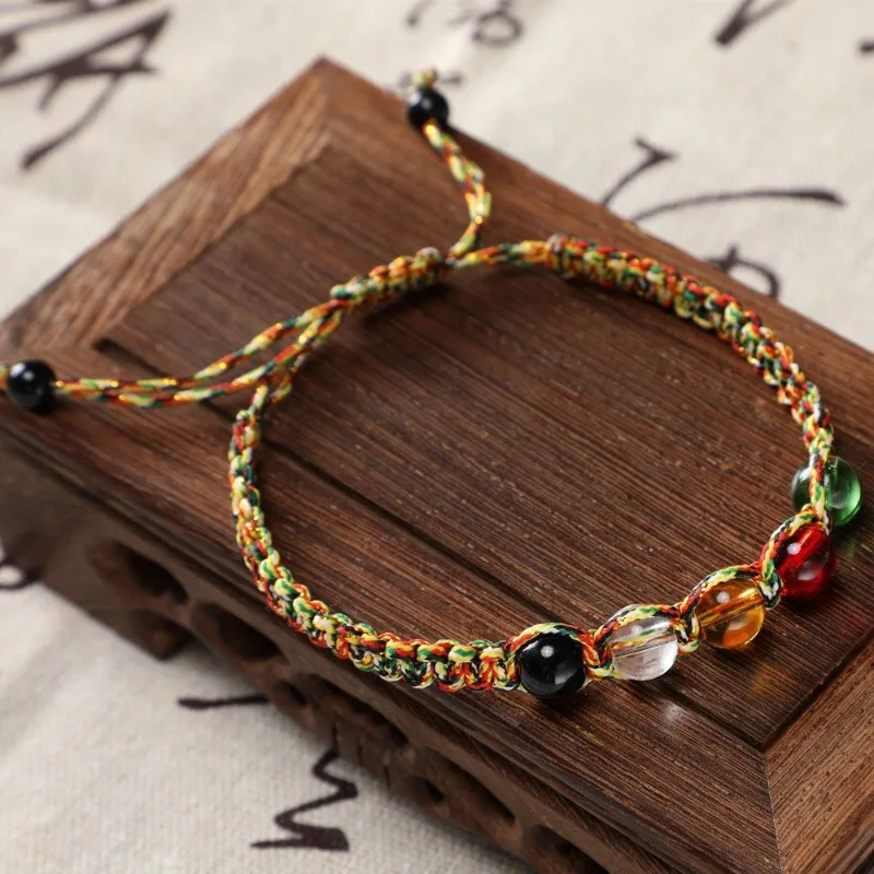 

Ethnic Hand-woven Multi Colored Rope Bracelets with 5 Color Glass Beads Stretch Chinese Five Elements Feng Shui Lucky Charm