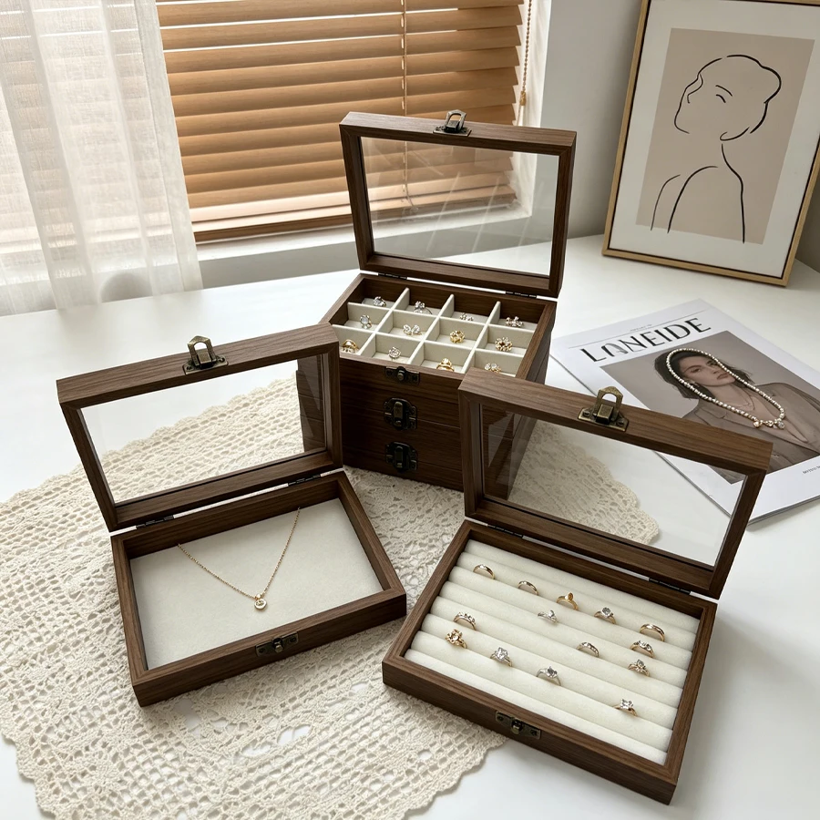 Walnut Wood Multi-Sized Jewelry Storage Box, Containing Different Jewelry Items Such as Rings, Earrings, and Stud Earrings, with