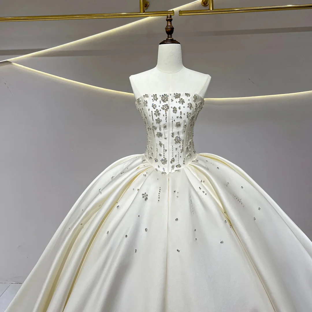 ชุดแต่งงานบอลกาวน์ผ้าซาตินสุดหรู แบบไร้สาย ประดับลูกปัด สไตล์เจ้าหญิง  สามารถสั่งตัดได้  ชุดเจ้าสาวแบบผูกเชือกด้านหลัง