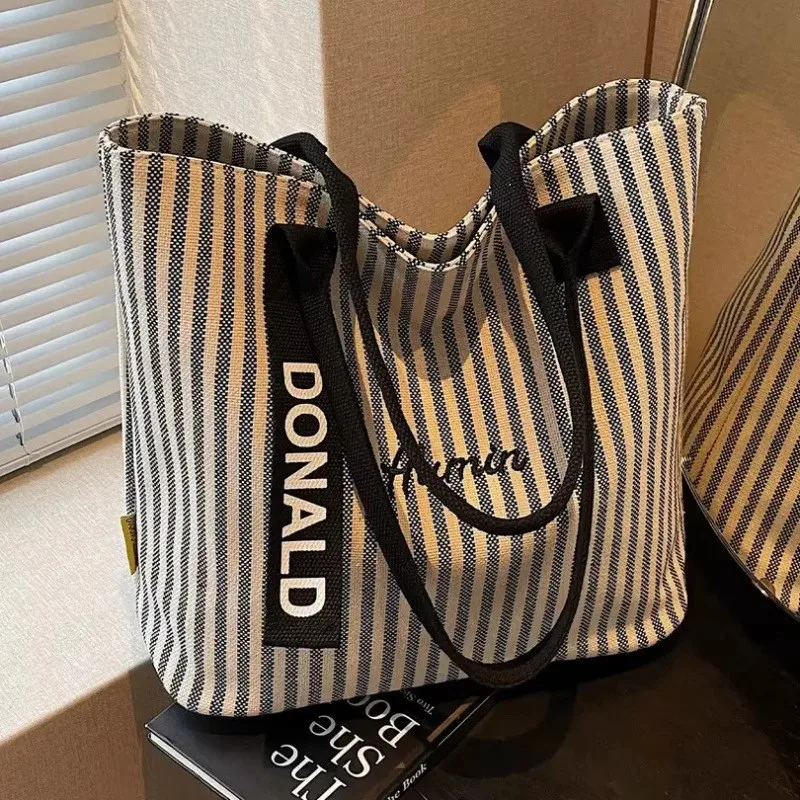 

​​Nautical Stripe Canvas Tote Women Heavy Duty Shoulder Bag Student Commuter Essential Water Resistant Classroom Ready​​
