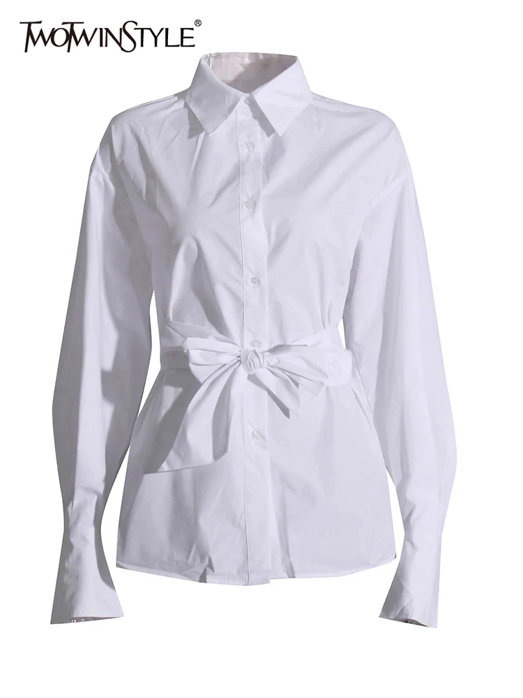 

TWOTWINSTYLE Solid Sexy Hollow Out Spliced Lace Up Shirt For Women Lapel Long Sleeve Patchwork Button Temperament Blouses Female