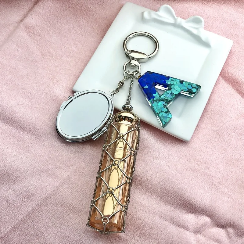 Hot Selling New Blue Letter Pendant Pendant Lipstick Net Pocket Silver Oval Mirror Keychain Gift 10PCS