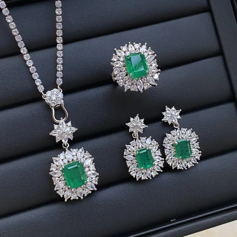 French style emerald crystal pendant necklace with full diamonds, earrings and ring. Ladies' fashionable and elegant banquet jew