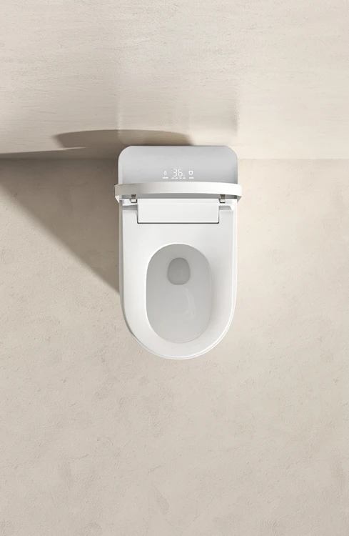 Inteligentne siedzisko toaletowe JM810L z kontrolą, nieskończone ciśnienie wody, inteligentny dodatek łazienkowy, odpływ S-trap, podgrzewane siedzisko.