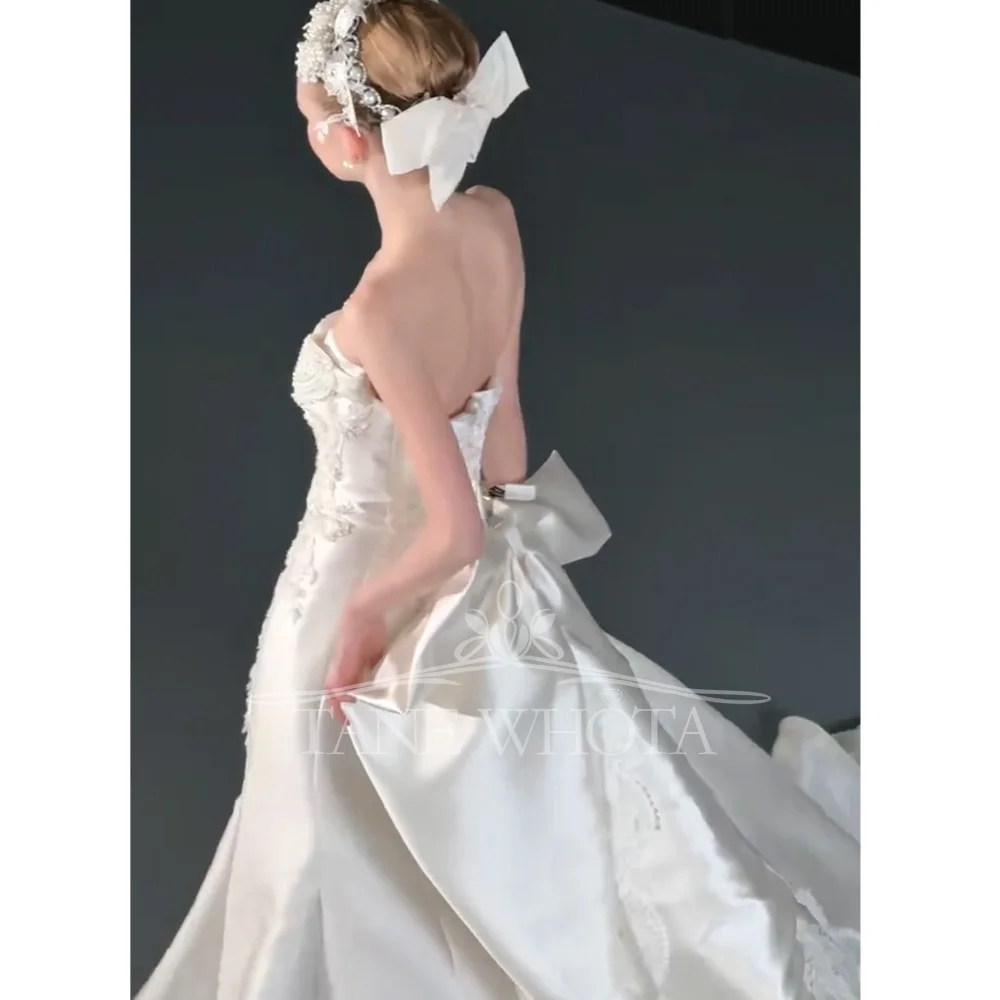 Vestido de novia de lujo, chaqueta desmontable personalizable con escote en forma de corazón, vestido de novia con lazo y vaina de cristal bordado, Trouwjurk