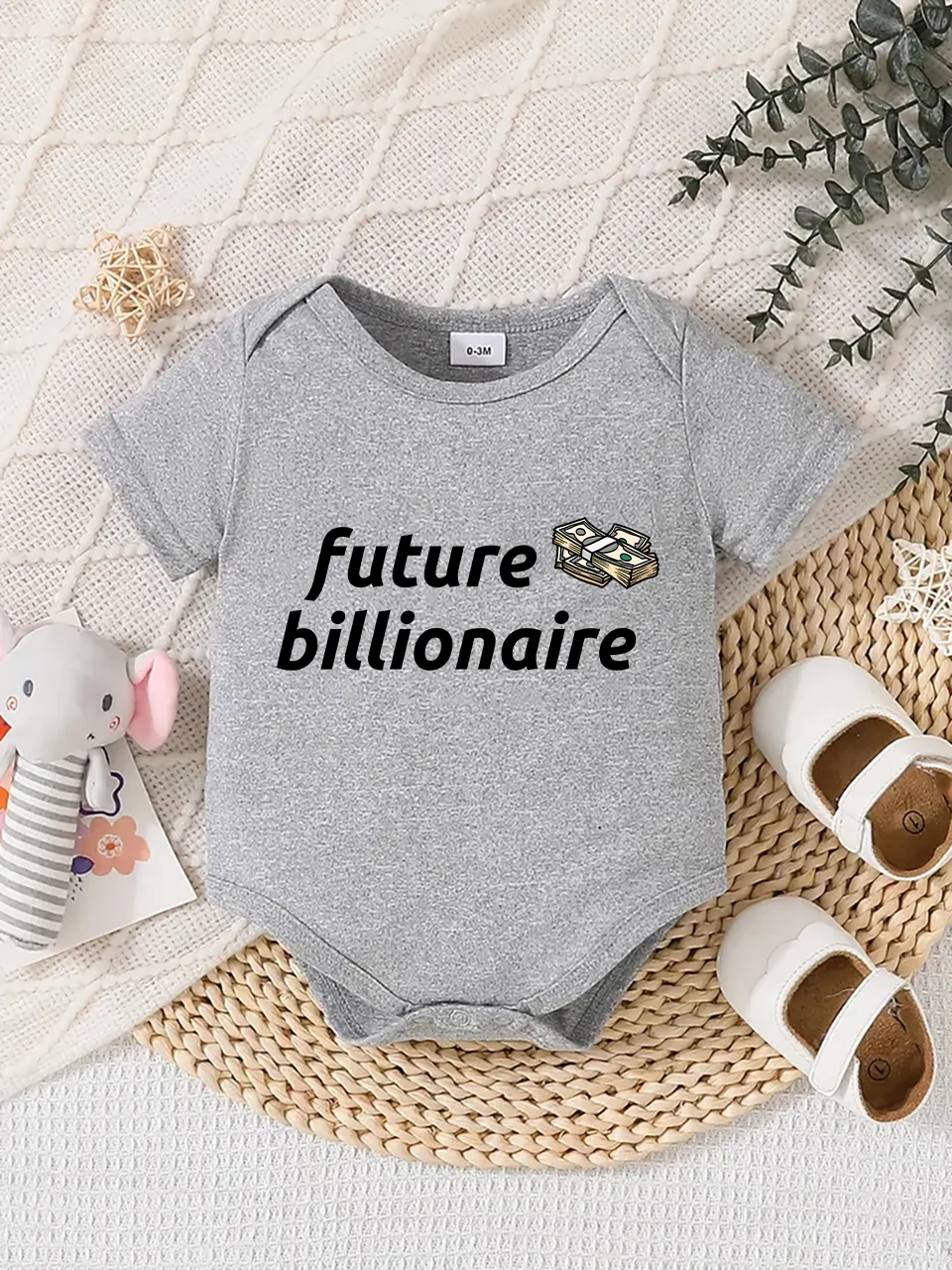 Playful letter-printed baby short-sleeve triangle bodysuit. Button closure for easy dressing, machine washable