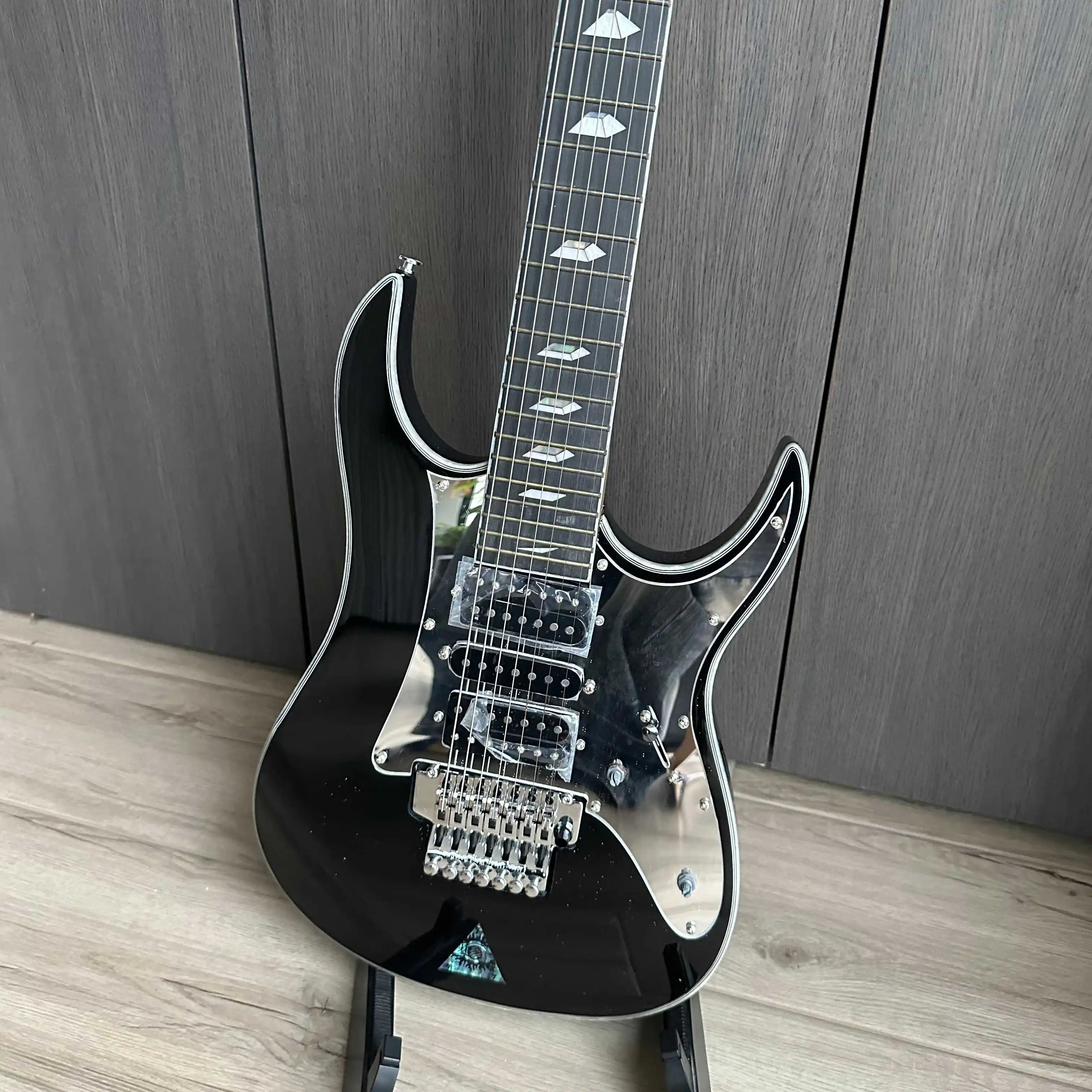 7 Strings Black Electric Guitar with Mirror Guard HSH Pickups Tremolo Bridge for Advanced Players