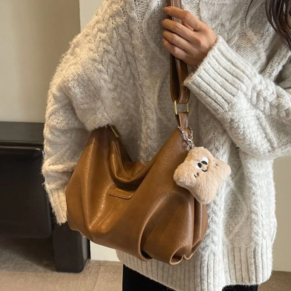 

Elegant PU Dumpling Bag with Cute Pendant Soft Leather Casual Crossbody Bag Large Capacity Korean Style Messenger Bag Female