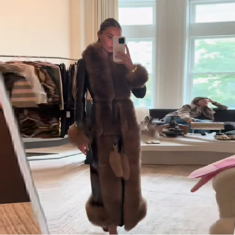 Moda mujer Otoño Invierno abrigo de piel sintética de alta calidad abrigo largo peludo suelto chaqueta cálida 2025 señora nueva prendas de vestir de calle alta