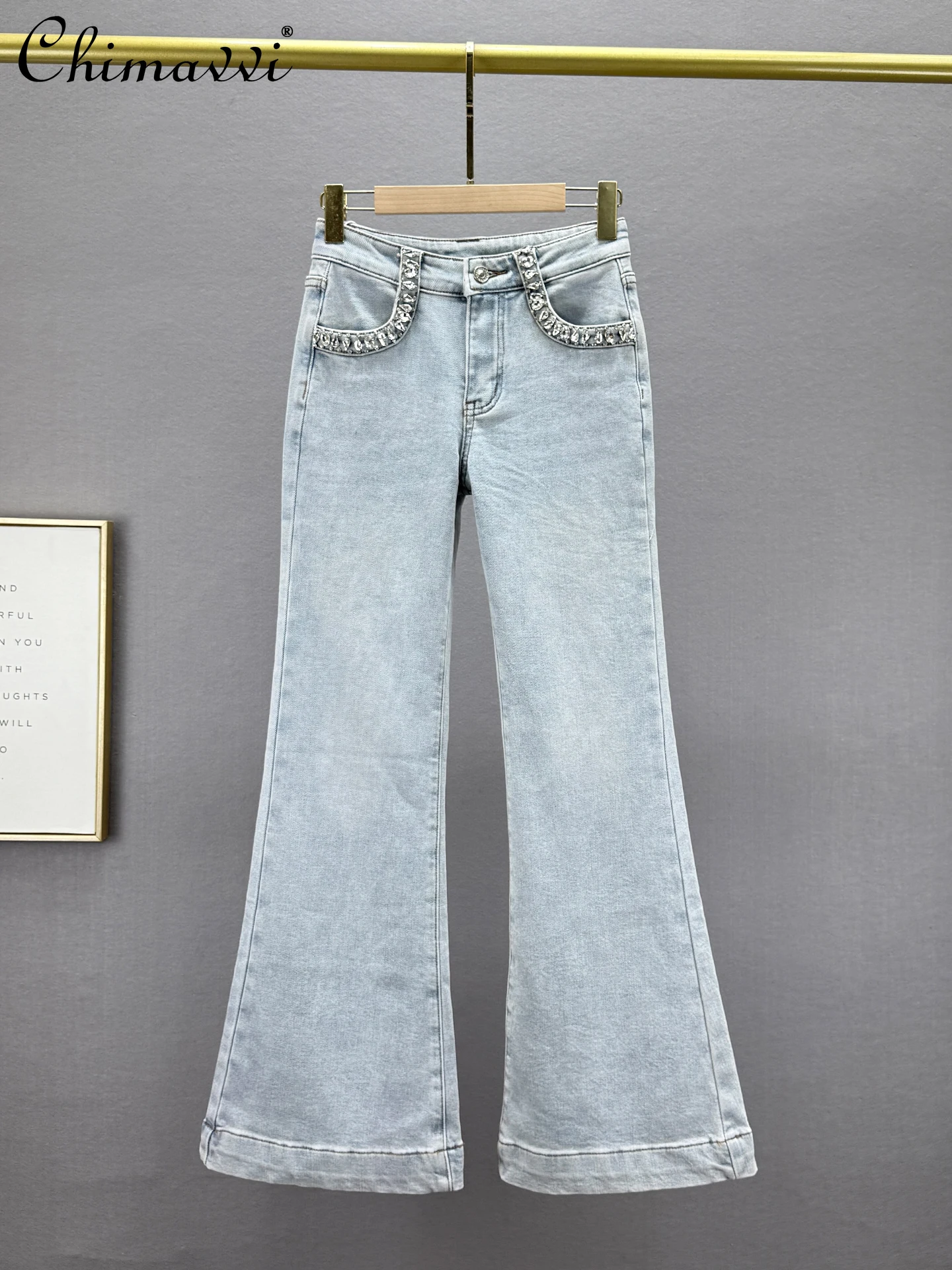 جينز عصري مبطن بالصوف للنساء شتاء 2025 جديد عالي الخصر بقصة ضيقة على الطراز الأوروبي سروال واسع مزين بحجر الراين