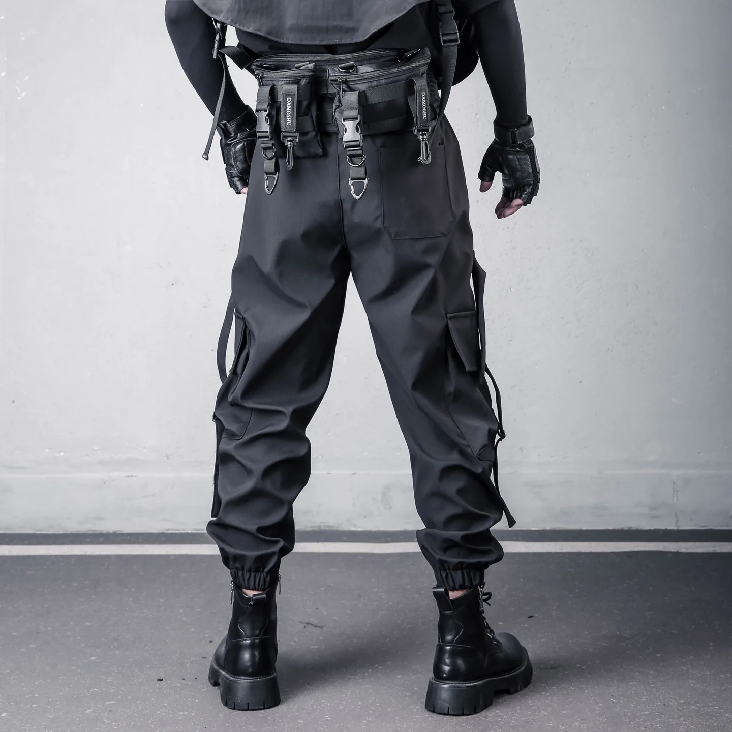 Dark Techwear-style multi-pocket drawstring paratrooper pants, men's ankle banded working designer tactical trendy casual pants.
