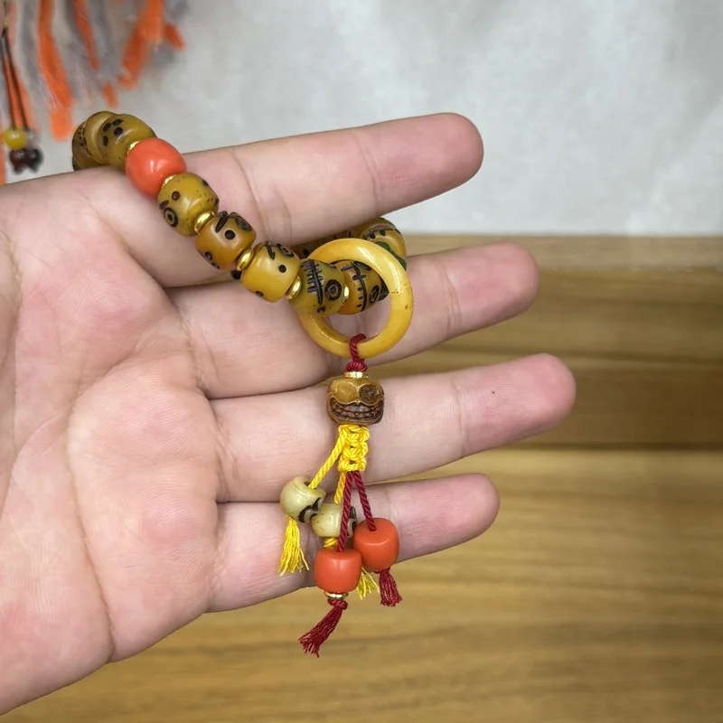 Tibetan-style bone-carved single-loop bracelet, hand-woven with movable rings, a vintage accessory for men and women