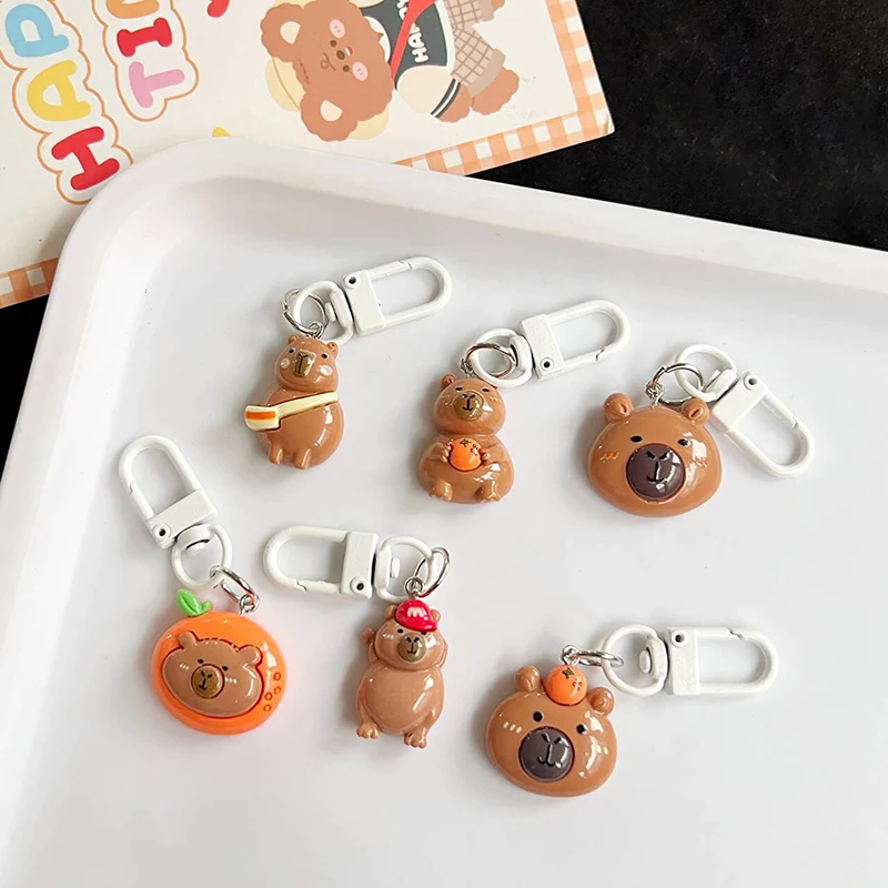 Porte-clés de dessin animé Capybara, joli porte-clés en résine, pendentif de sac Kawaii, sac à dos, étui pour écouteurs, breloques, cadeaux pour filles