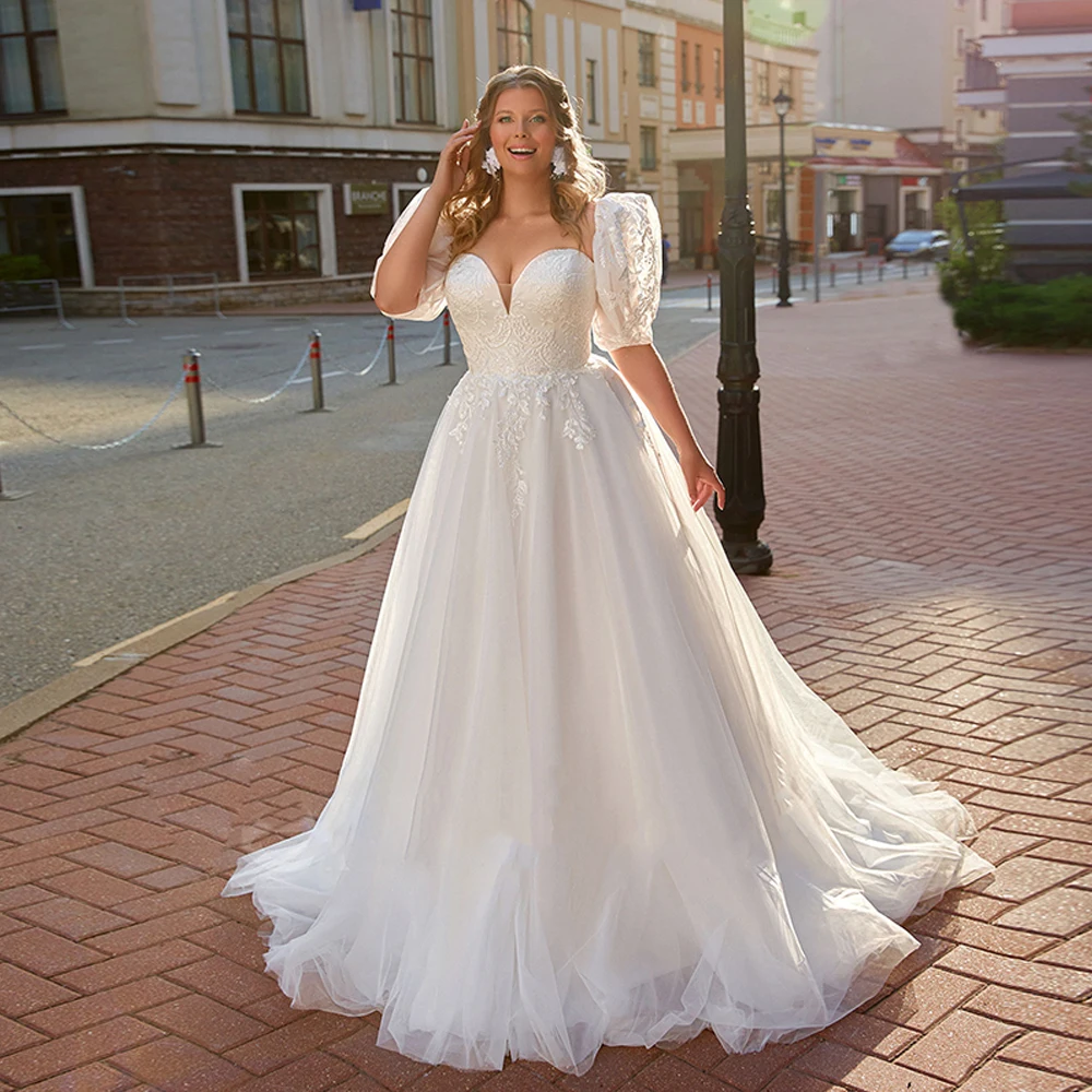 Vestido de novia de princesa, prenda de talla grande, escote Corazón, mangas cortas abullonadas, apliques de cola de barrido, corsé ajustable