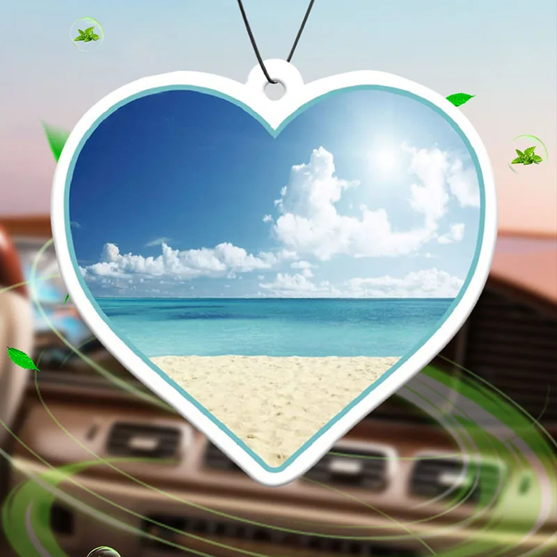 Playa, océano, escena, hotel intercontinental en forma de corazón (perfume de hotel), perfume neutro para automóvil y ambientador no tóxico | Aceites Esenciales Naturales y Comprimidos De Fragancias De Aromaterapia (Noroali/Promelo/Cedro) | Tipo colgante y se puede utilizar como clip de ventilación | Fragancia duradera durante 60-90 días | Desodoriza y purificar el aire | Adecuado para uso en automóviles, hogares, armarios y baños. | Diseño de animación de dibujos animados | La misma fragancia que los productos de la tienda.