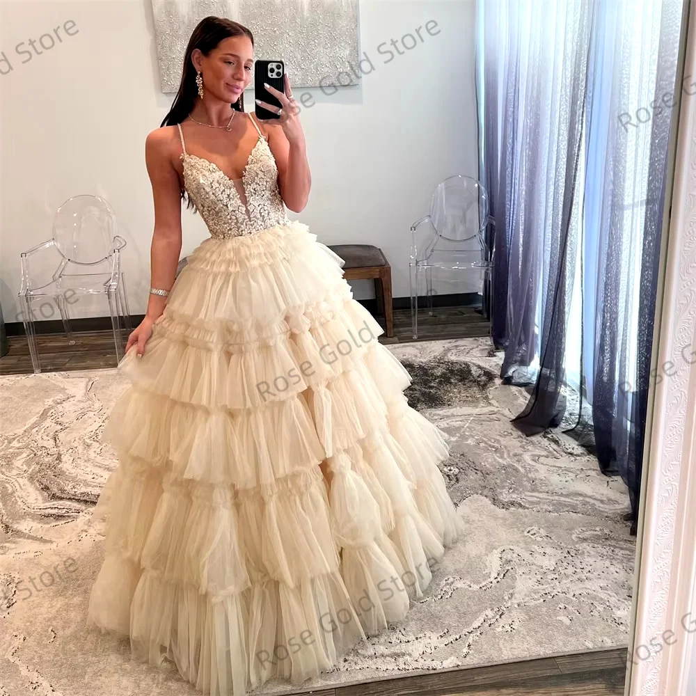 فساتين لحضور الحفلات الموسيقية باللون البيج للنساء بحزام سباغيتي فستان سهرة أنيق بدون أكمام مخصص لحفلات التل فيستدوس دي فييستا 2024