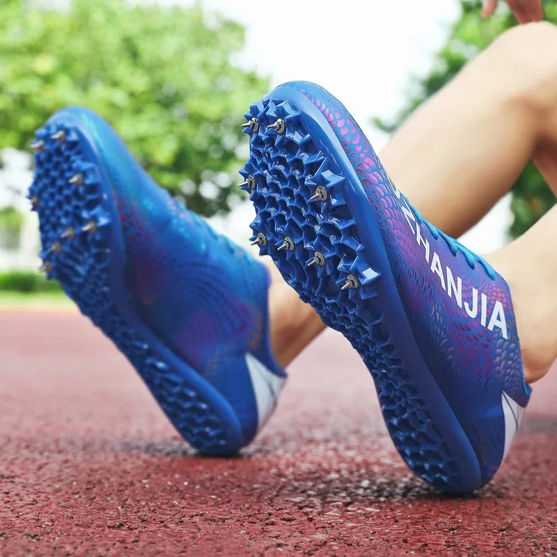 

Men Women Track and Field Shoes Light Wight Spikes Running Footwears Professional Walking Sneakers Gym Shoes