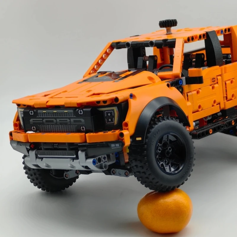 

Конструктор Ford Raptor F-150: внедорожный гоночный автомобиль, 1379 деталей, креативный набор для самостоятельной сборки, подходит для различных моделей.