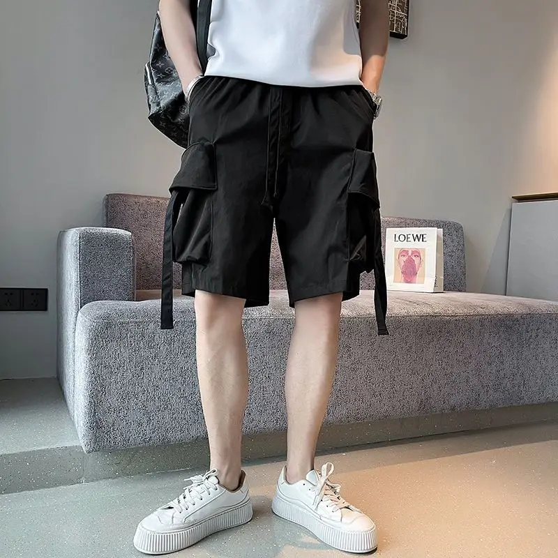 Estilo safari cor sólida bolsos elegantes shorts de carga roupas masculinas verão solto em linha reta elástico drawstring calças na altura do joelho