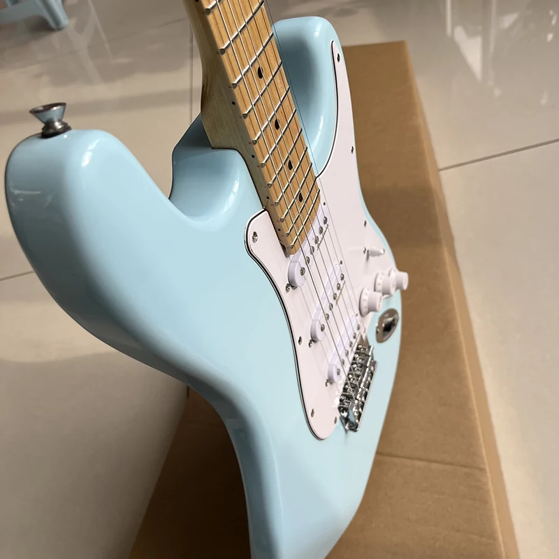 Classic ST electric guitar, high quality vibrato system, light blue surface, professional solid wood, free door-to-door delivery