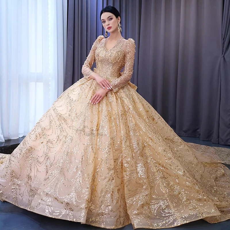 

Luxury Gold Sequined Lace Wedding Dress for Fairytale Weddings Long Sleeve V-Neck Bridal Dress with Sweeping Train Customized