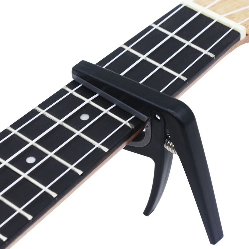 

Ukulele Capo ABS Material Capo Trigger Style Lightweight Good Hand Feeling Musical Instruments for Ukulele