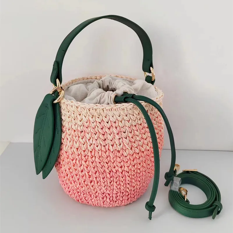 

2025 Luxury Versatile Cute Honey Peach Woven Basket Handbag Women Fashion Gradient Watermelon Bucket Bag Straw Craft Tote Bag