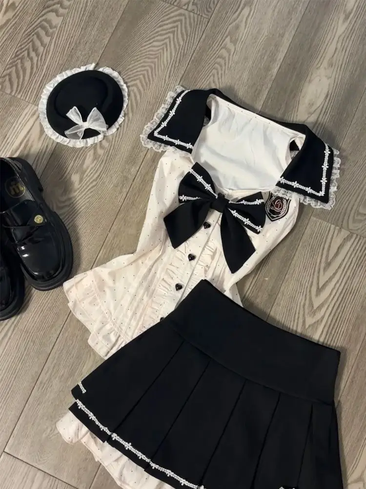 

Элегантный лоскутный комплект в консервативном стиле, женский милый дизайн, рубашка без рукавов, топ + мини-юбка, костюм из двух предметов с шикарным бантом, новинка 2023 года