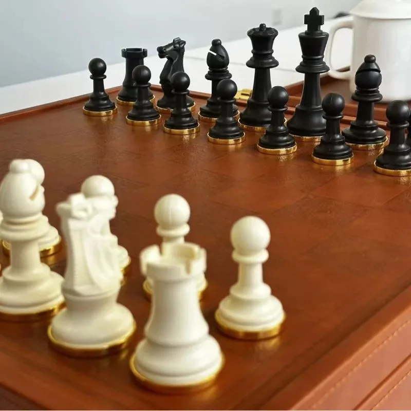 

Chess, high-end leather chessboard chess box integrated, metal base chess pieces