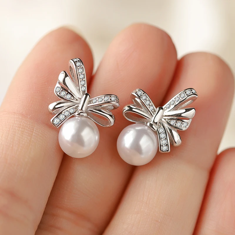 

Elegant and Unique Authentic S925 Silver Butterfly Pearl Women's Stud Earrings Commuting Versatile