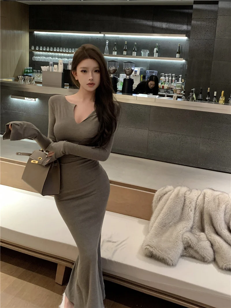 

Grey Knitting Long Sleeved V-neck Dress For Women 2024 Autumn And Winter Sexy Medium Length Tight Fitting Inner Lining Dress