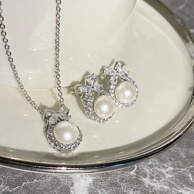 

MDLFES Moissanite style Imitation natural pearl set Gold-plated small delicate sparkling necklace and earrings