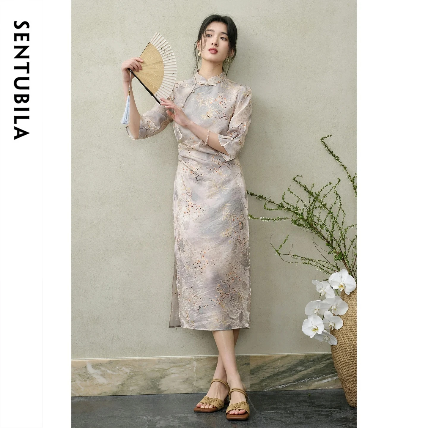 

SENTUBILA Women's Chinese Style Dress 2026 Spring New Elegant Stand Collar Frog Button Asymmetrical Print Floral Dress 161LV6376