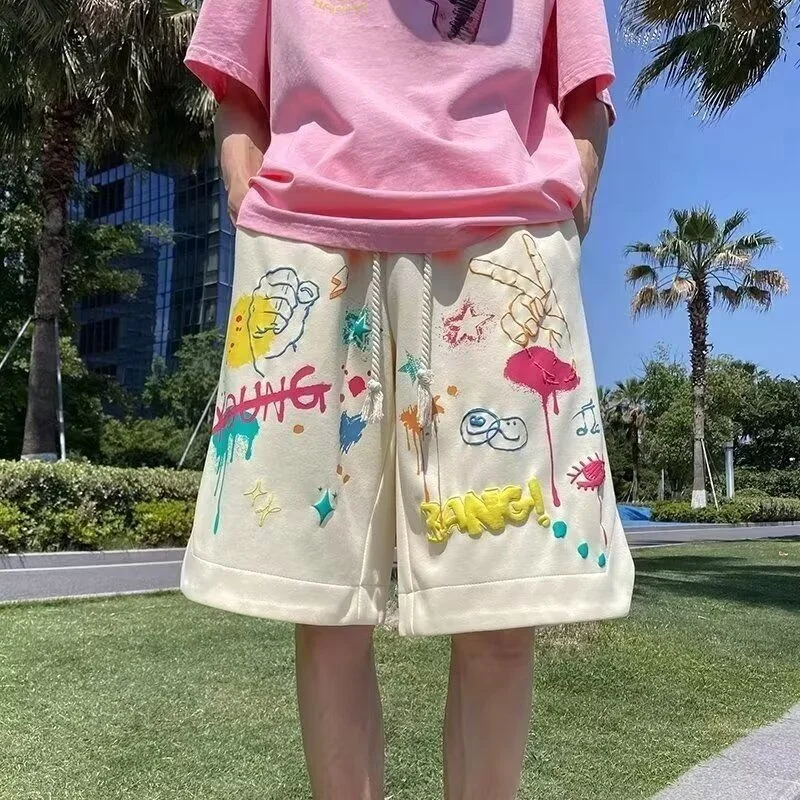 

Новые летние мужские брюки в американском стиле, тонкие дизайнерские свободные спортивные повседневные брюки большого размера с пятью четвертью, молодежная активная одежда из полиэстера...