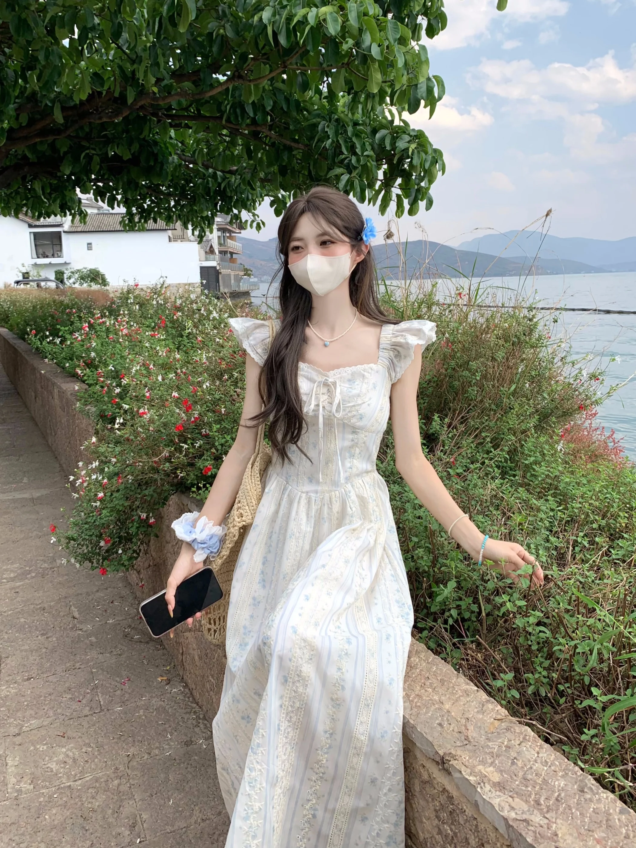 กระโปรงทรงเอลายดอกไม้ฤดูร้อนสำหรับผู้หญิง สไตล์หวานๆ เหมาะสำหรับพักเที่ยง วันหยุดพักผ่อน หรือใส่ไปทำงาน ความยาวปานกลาง