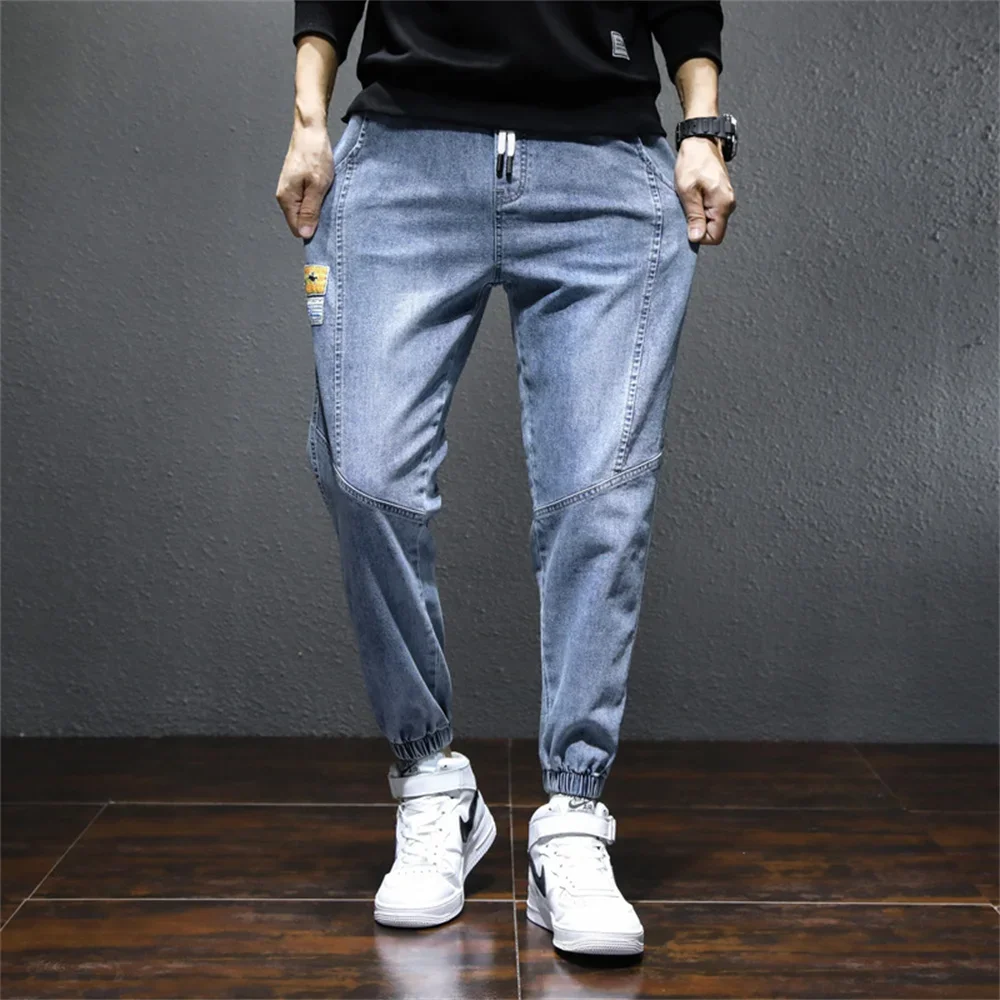 American street print alphabet star jeans men and women hip-hop high street spring and autumn loose straight drag casual pants