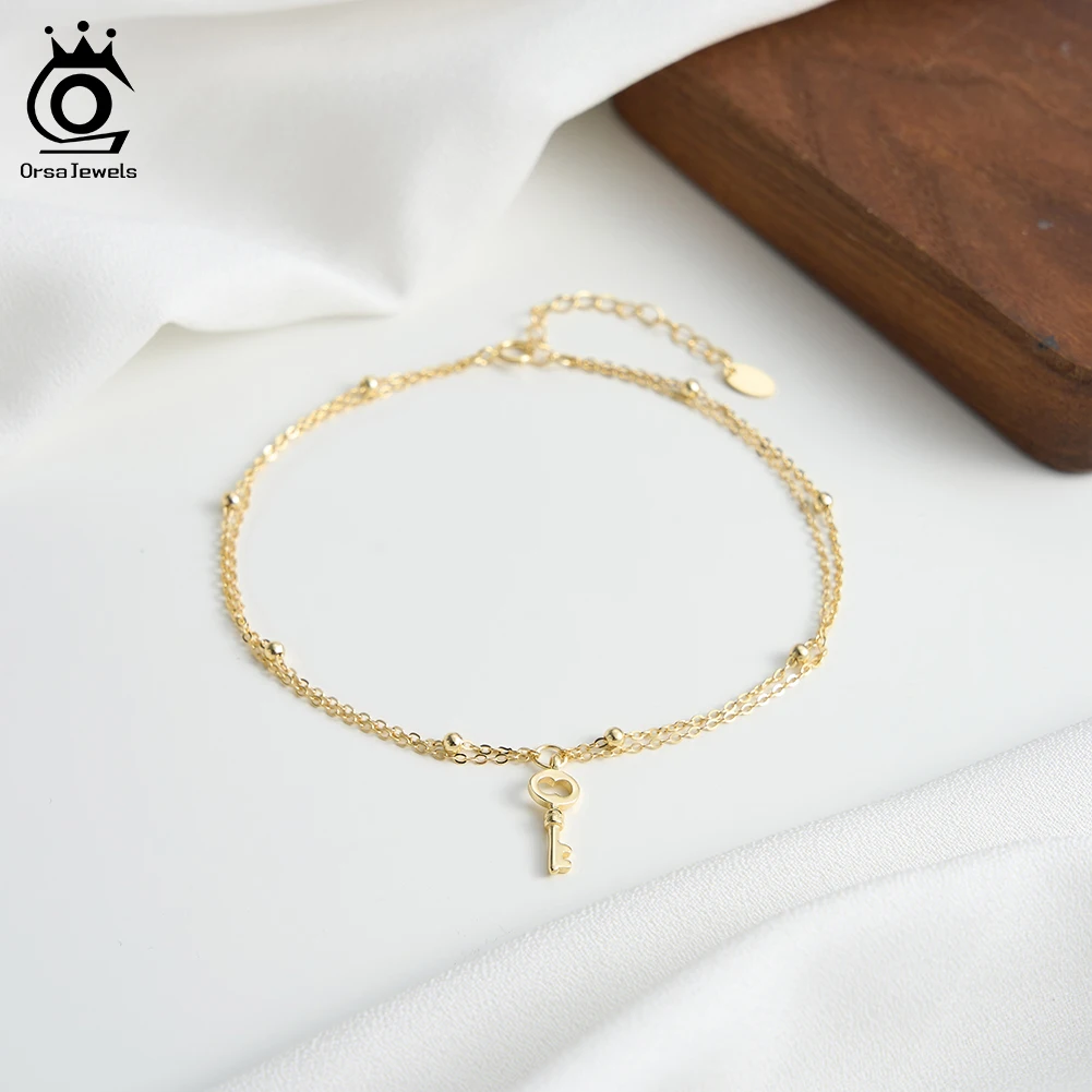 

ORSA JEWELS Elegant Layered S925 Silver Satellite Anklet with Key Pendant for Women Summer Foot Chain Straps Jewelry SA102