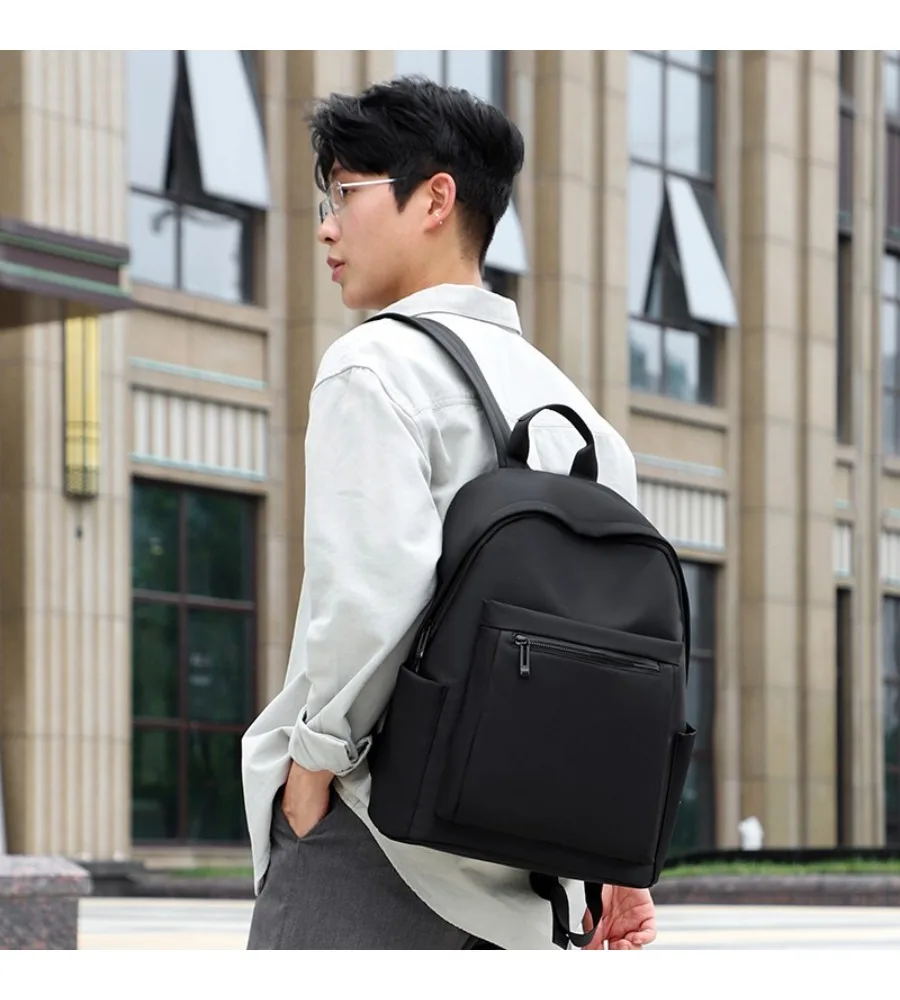 Fashion computer backpack simple casual college student schoolbag new men's backpack light commuting tide