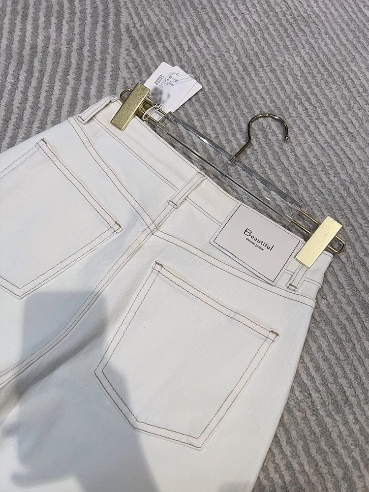 

Белые прямые джинсы со сращенными штанинами. Женские широкие брюки. Длинные брюки с талией. Купите наши джинсы, которые вы не выглядит друг другу.