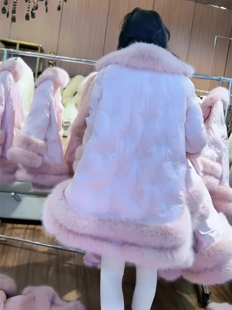 أزياء شتاء جديدة رائعة وراقية فضفاضة ونمط غربي تقلل من العمر سترة حلوة ورقيقة للنساء